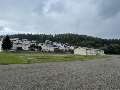 FlossenburgResidential houses on former camp ground. Building in the right foreground is former prison kitchen (2025)