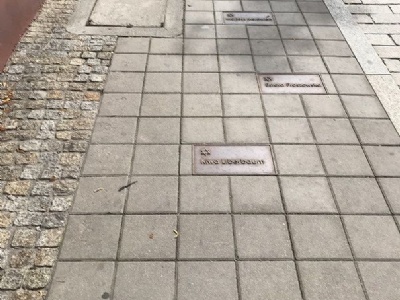 Kielce – Planty 7Memorial plaques on the sidewalk