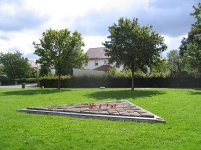 NiederhagenMemorial monument. In the background is the former camp entrance